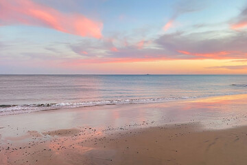 Fototapeta na wymiar Sunset over the sea, beautiful cloudscape 