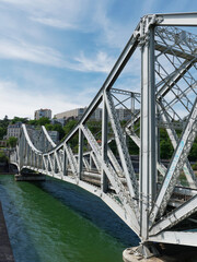 Metallic La Mulatière railway bridge in Lyon over Saone river, near confluence district, built in 1912 by Levallois-Perret (formerly Eiffel)