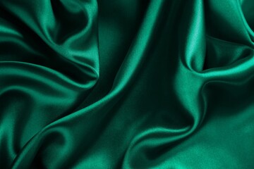 Obraz premium Dark green soft silk satin fabric.