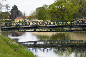 Fototapeta na wymiar Friederiken Bridge over the Graft of the Great Garden in Hanover was created in connection with the creation of the Georgengarten in 1839/40 according to a design by the court architect F. Laves.