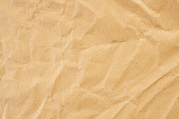 Abstract brown crumpled creased recycle paper texture background