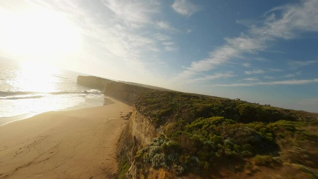 sandy cliff and an ocean beach in Australia