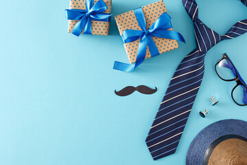 Celebrate Father's Day concept. Top view flat lay of gift boxes trendy necktie hat glasses cufflinks and paper mustache on light blue background with empty space for special message - obrazy, fototapety, plakaty