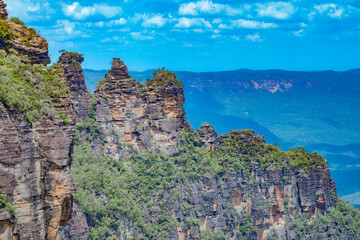 Fototapeta na wymiar The Three Sisters sandstone rock formation, Blue Mountains National Park, in the Greater Sydney Region New South Wales, Australia.