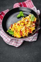 scramble eggs pepper paprika healthy meal food snack on the table copy space food background rustic top view
