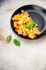 scramble eggs pepper paprika healthy meal food snack on the table copy space food background rustic top view