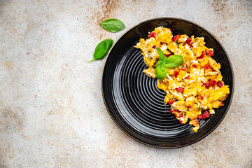 scramble eggs pepper paprika healthy meal food snack on the table copy space food background rustic top view