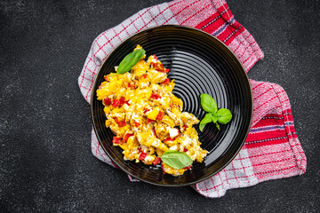 scramble eggs pepper paprika healthy meal food snack on the table copy space food background rustic top view