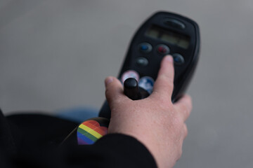 A disabled LGBTQ powerchair user shows how they use their powerchair, expressing themes of...