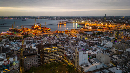 aerial view Montevideo, Uruguay industrial container shipping port illuminated at night