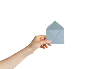 hand holding an envelope. the concept of sending a letter with a message. delivery of the letter.