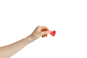 hand holds a small red paper heart. love gift concept.