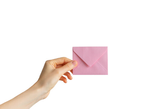 hand holding an envelope. the concept of sending a letter with a message. delivery of the letter.