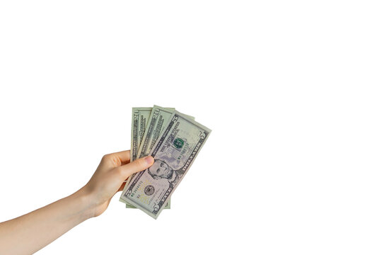 hand holds money banknotes dollars on a white background. business concept of money transfer, cash payment.