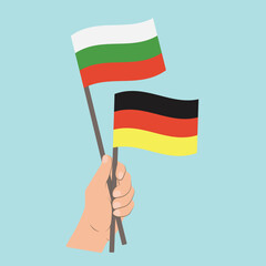 Flags of Bulgaria and Germany, Hand Holding flags