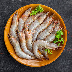 shrimps raw seafood prawn healthy meal food snack on the table copy space food background rustic top view