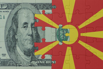 puzzle with the national flag of macedonia and dollar money banknote. macro.concept.