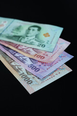 Thai baht banknotes. Cash money of Thailand. Thai economy and financial system concept.