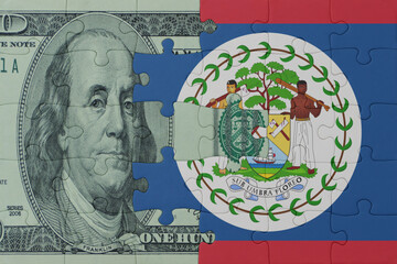 puzzle with the national flag of belize and dollar money banknote. macro.concept.