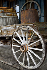 Fototapeta na wymiar Old vintage wood hitch wagon and wood barrels