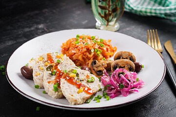 Chicken meatloaf and stewed cabbage, roasted mushrooms. Keto, paleo breakfast. Healthy lunch menu. Keto food.