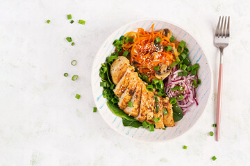 Grilled chicken fillet and carrot pasta. Healthy lunch menu. Keto food. Top view