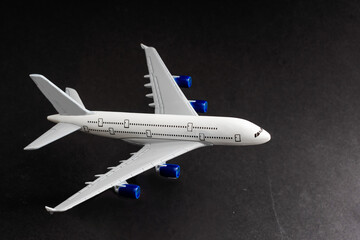 Model plane, airplane on dark background