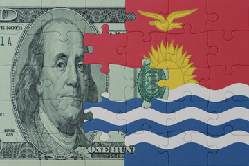 puzzle with the national flag of Kiribati and dollar money banknote. macro.concept.