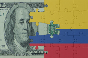 puzzle with the national flag of colombia and dollar money banknote. macro.concept.