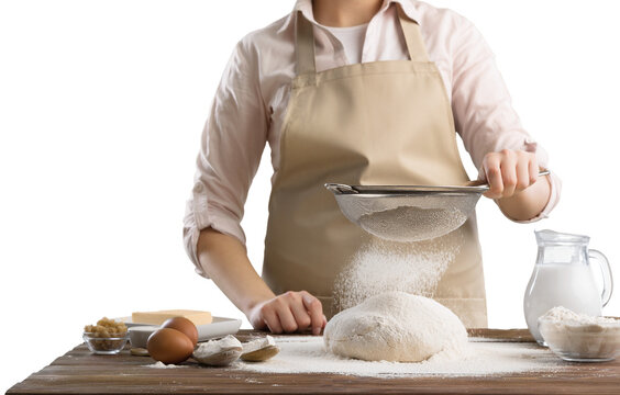 Hands cooking homemade bread dough on wooden table