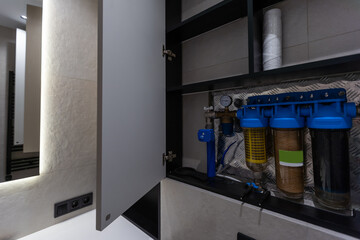 Replaceable cartridges in the water filter system. Water filtration system with replaceable...