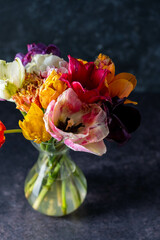 Colorful tulips in a bouquet with pink, red, yellow flowers