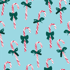 Candy cane with bow knot seamless pattern. Christmas, winter holidays print on a blue background. For wrapping paper, textile, fabric. Vector illustration.