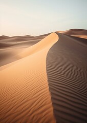 Fototapeta na wymiar Minimalist sand dunes, soft curves, warm desert tones, simplicity, serenity, high-resolution photography, early morning light
