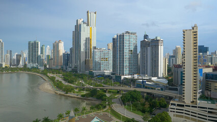 Naklejka premium Sun shining on modern financial district with tall skyscrapers in Panama City