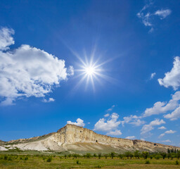 Fototapeta premium alone white mount top at the summer sunny day