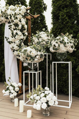Trendy decor for wedding ceremony. Part of the festive decor, floral arrangement.	
