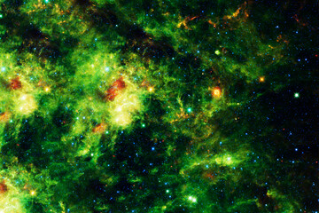 A beautiful green galaxy in dark space. Elements of this image furnished NASA.