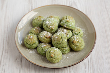 Homemade Soft Amaretti with Pistachio on a Plate, side view.