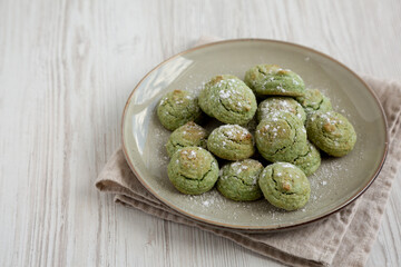Homemade Soft Amaretti Cookies with Pistachio on a Plate, side view. Copy space.