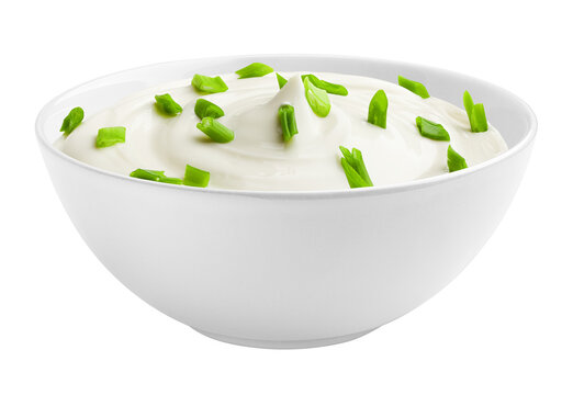 sour cream with onion, parsley, dill, herbs in bowl, isolated on white background, full depth of field