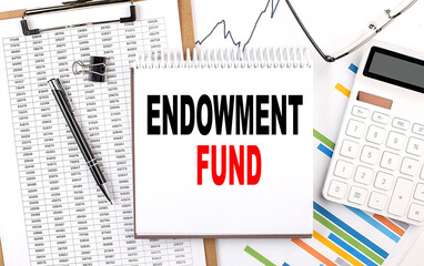 ENDOWMENT FUND text on notebook with chart, calculator and pen