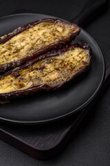 Delicious eggplant cut into two halves baked with salt, spices and herbs