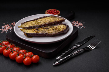 Delicious eggplant cut into two halves baked with salt, spices and herbs