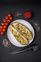 Delicious zucchini cut into two halves baked with salt, spices and herbs