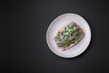 Delicious Atlantic herring marinated with salt and spices