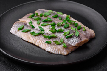 Delicious Atlantic herring marinated with salt and spices