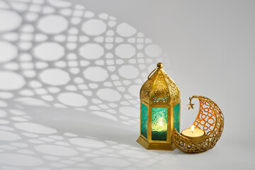 Islamic background with ramadan lantern and crescent moon.