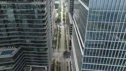 Cinematic glass concrete design business offices buildings in center of the city. Modern downtown Austin architecture, summer aerial Texas. Contemporary urban cityscape view, drone b roll 4K footage