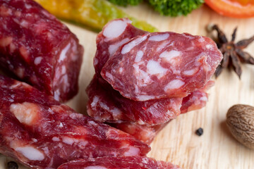 Sausage cut into pieces on the table
